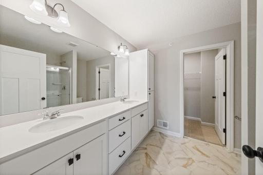 Photos of former model home, options and color selections will vary.