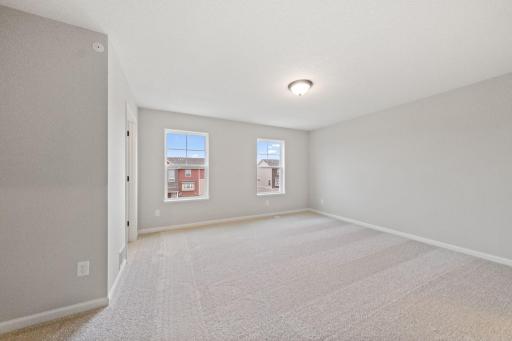 Photos of former model home, options and color selections will vary.