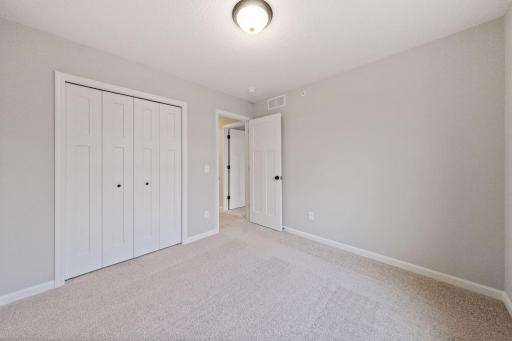 Photos of former model home, options and color selections will vary.