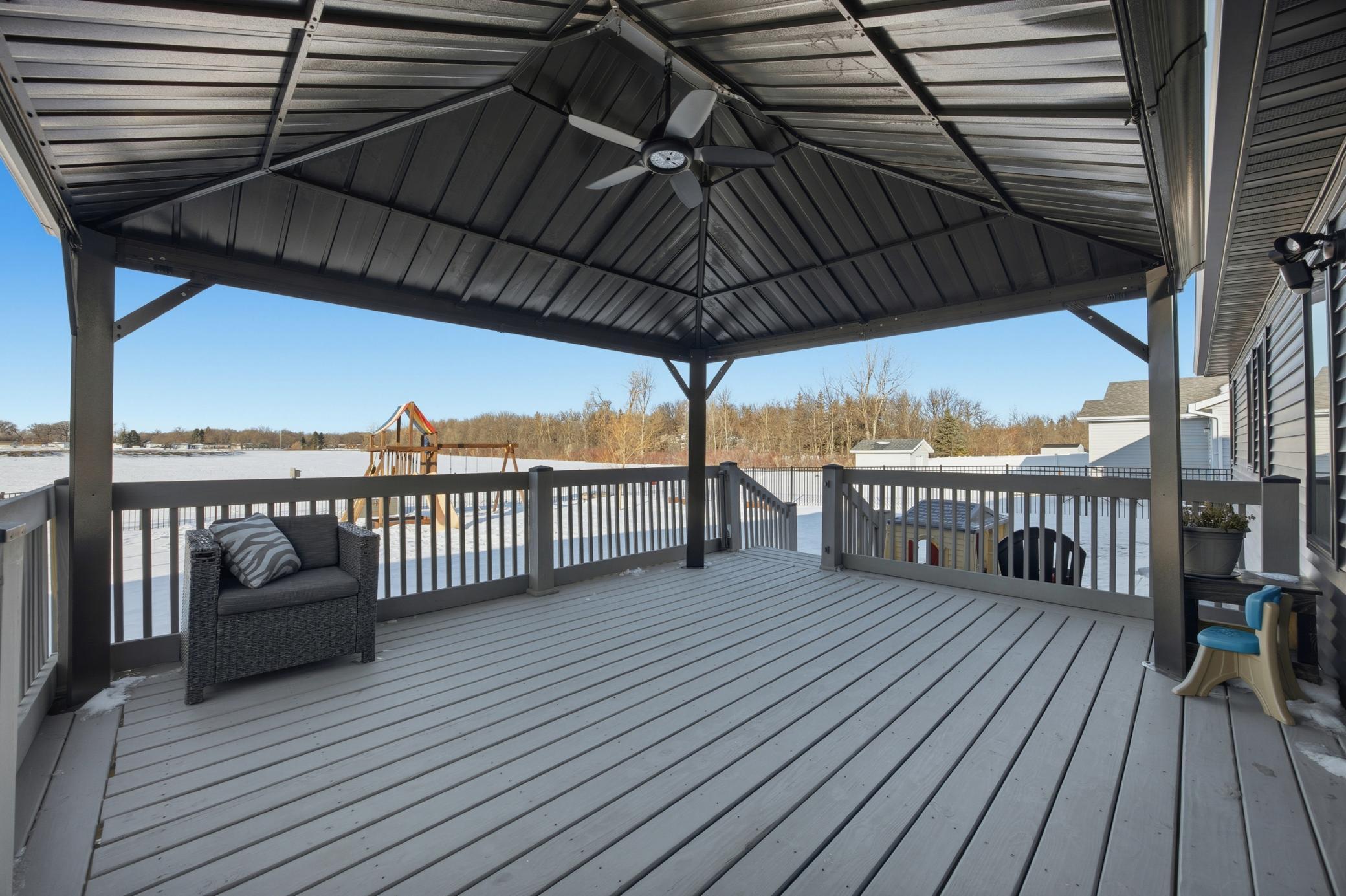 Enjoy the scenery under this gorgeous pergola, rain or shine!