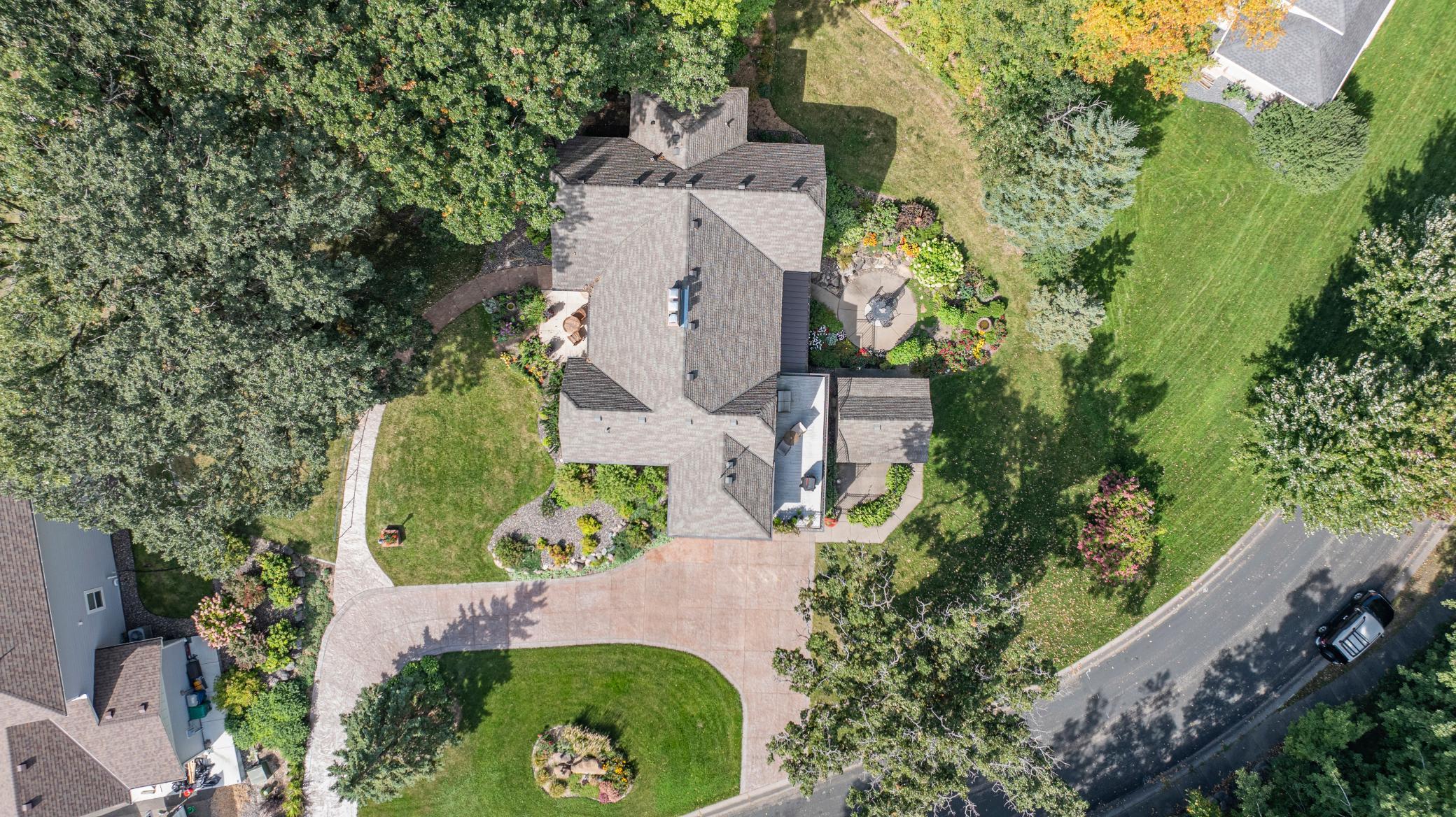 See the thoughtful landscaping and trees.