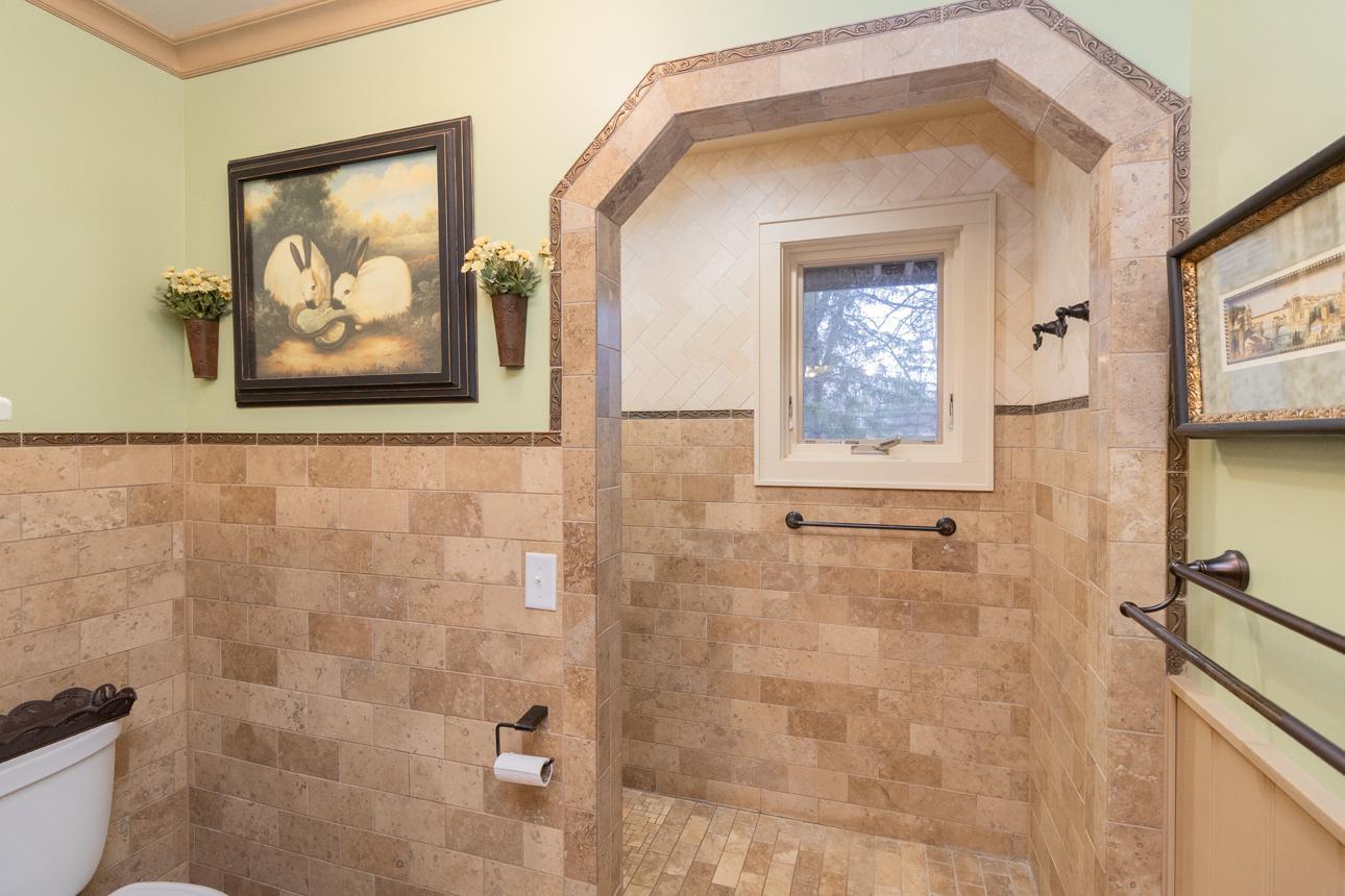 Tile shower with private window
