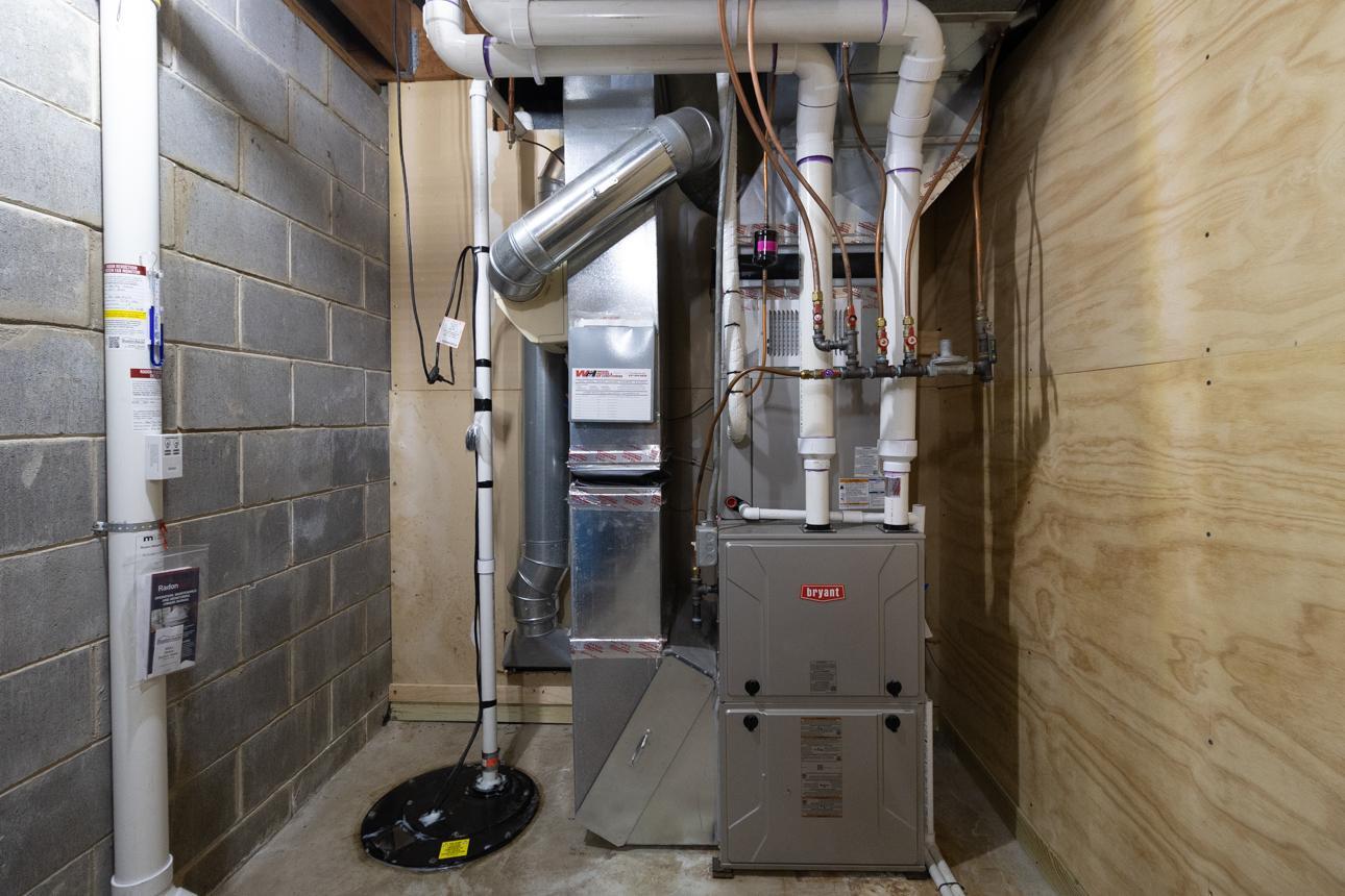 Home has a Bryant furnace, sump pump, and new radon mitigation system.