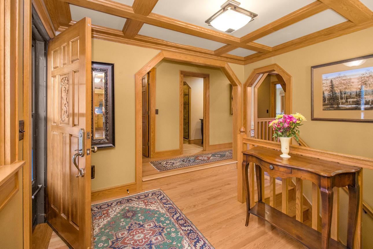 Entry - note the front door, ceiling, hardwood flooring.