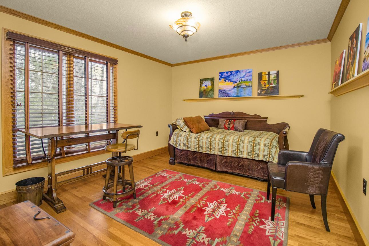 Main level bedroom with walk-in closet is being used as an office