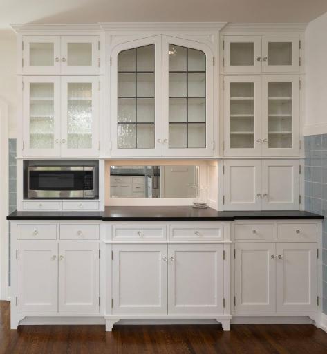 Charming cabinetry wall in all new kitchen