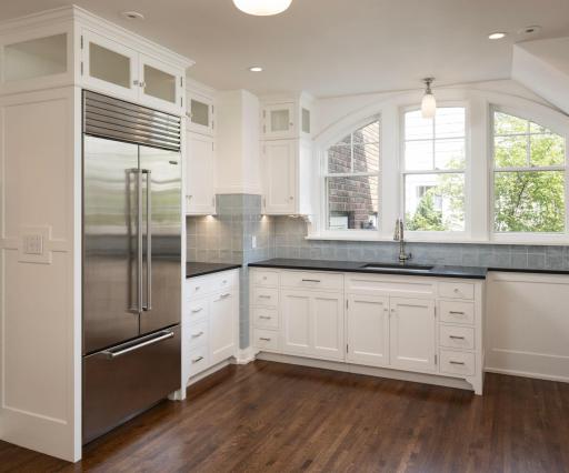 Custom, newer kitchen designed by architect David Heide; enameled cabinetry
