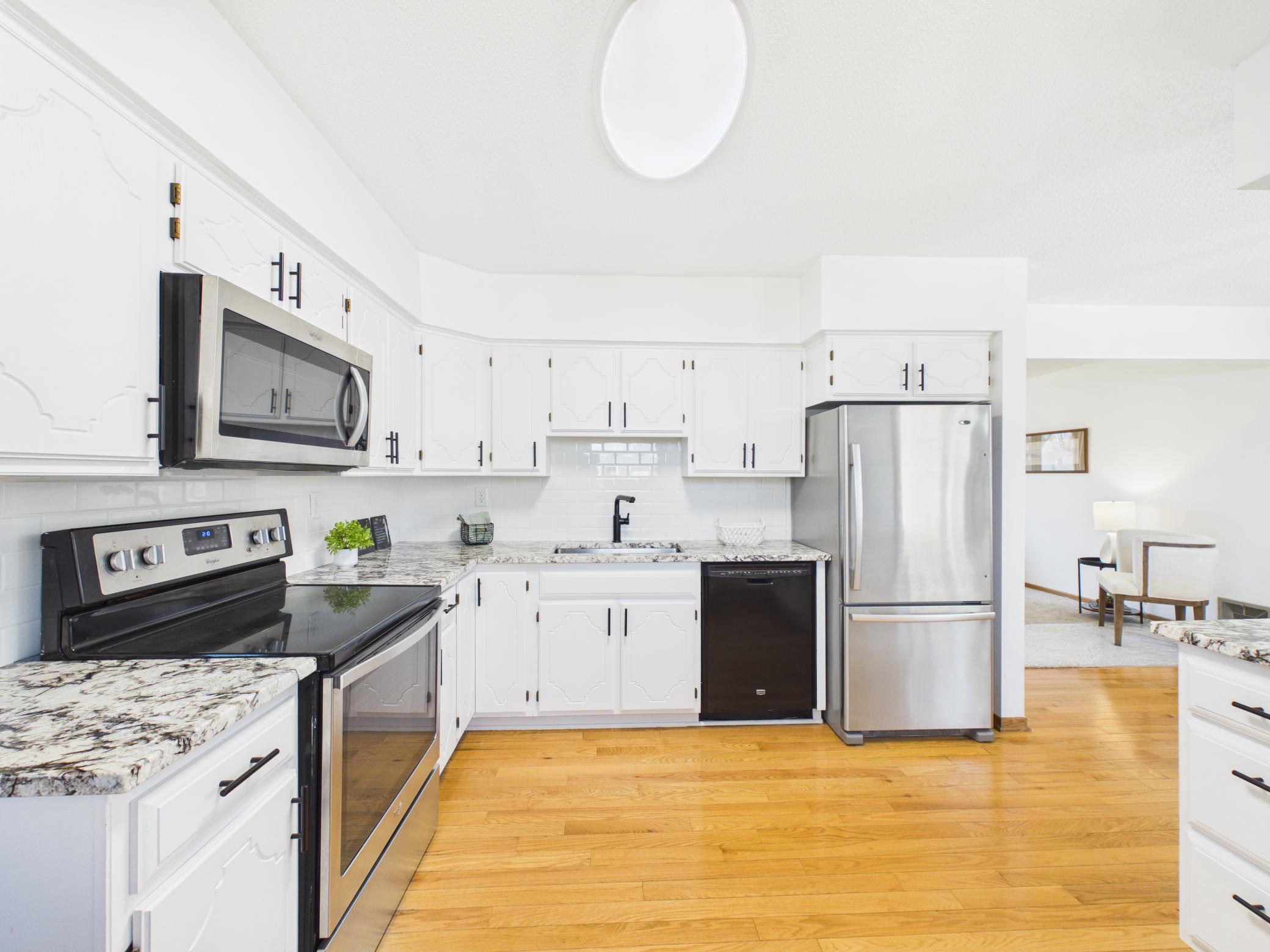 to the modern finishes (subway tile, granite, stainless steel)...