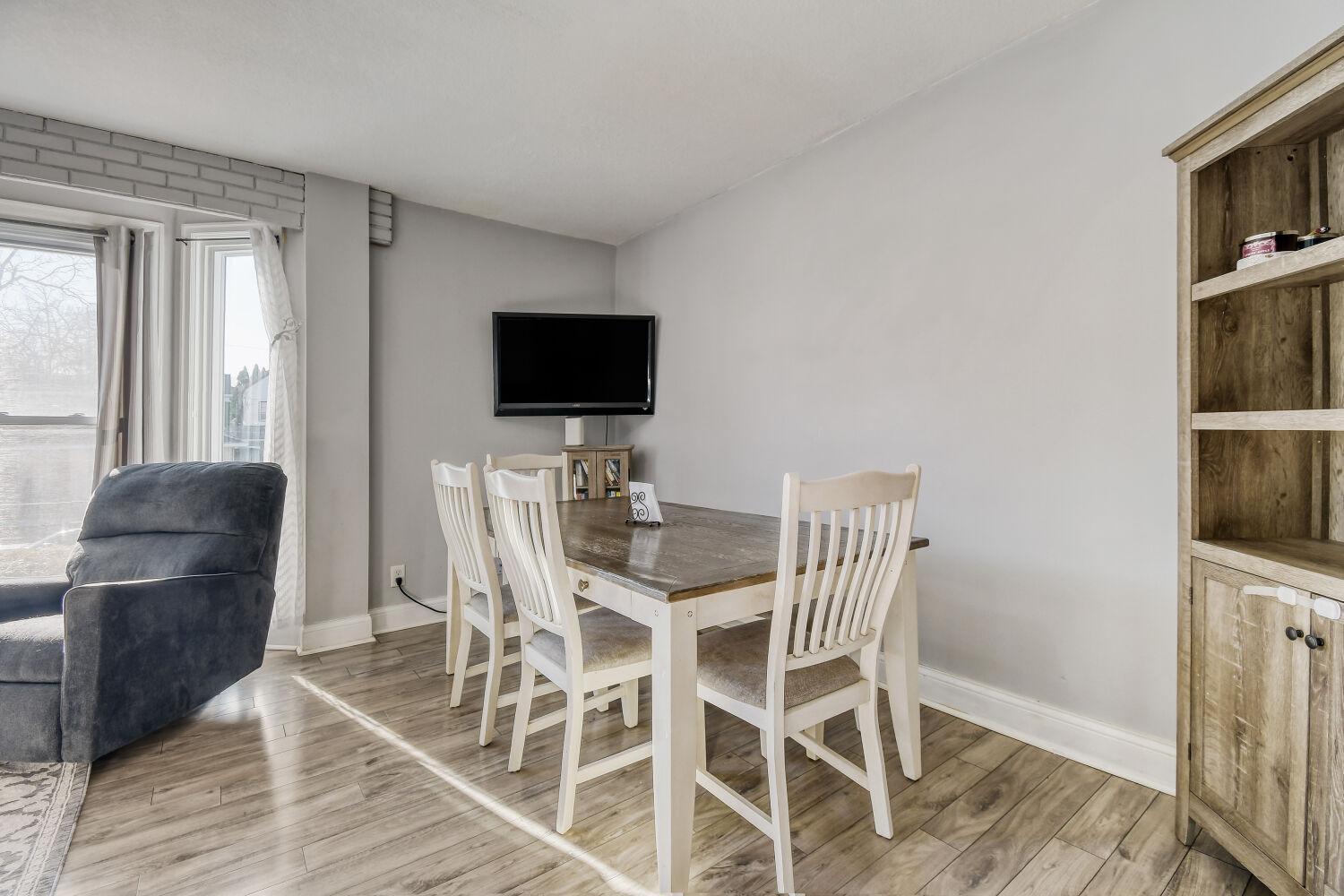 Informal Dining Room Offers Plenty Of Space For Dinners With Family And Friends!