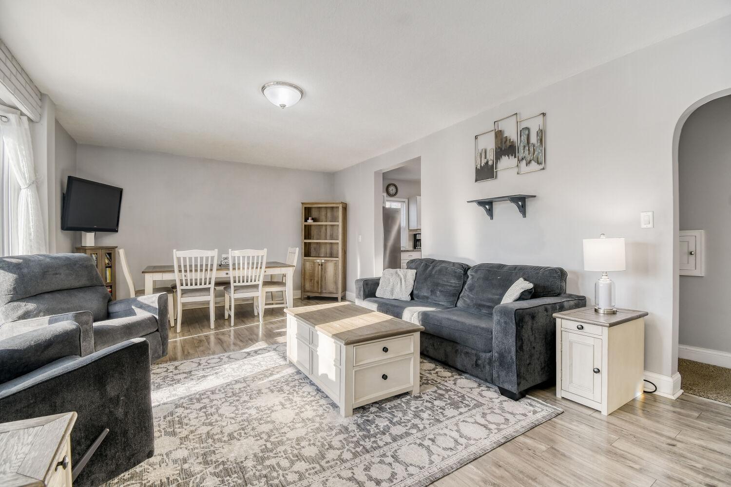 Large Sunlit Living Room Greets You!