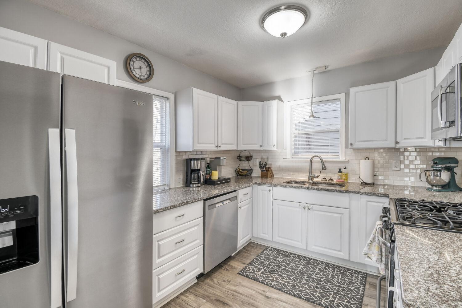 Kitchen Is Updated With Stainless Appliances