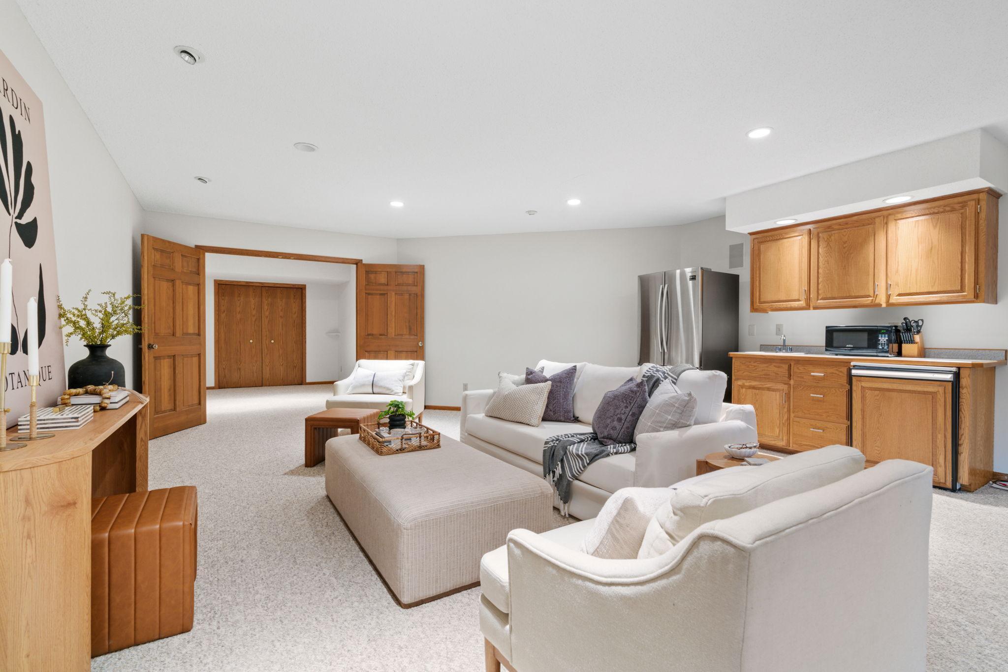 Fully equipped with. an additional bedroom, 3/4 remodeled bathroom, bonus room, wet bar, fireplace for those cozy holiday parties and a walkout to the large and private backyard for the summer grill outs.