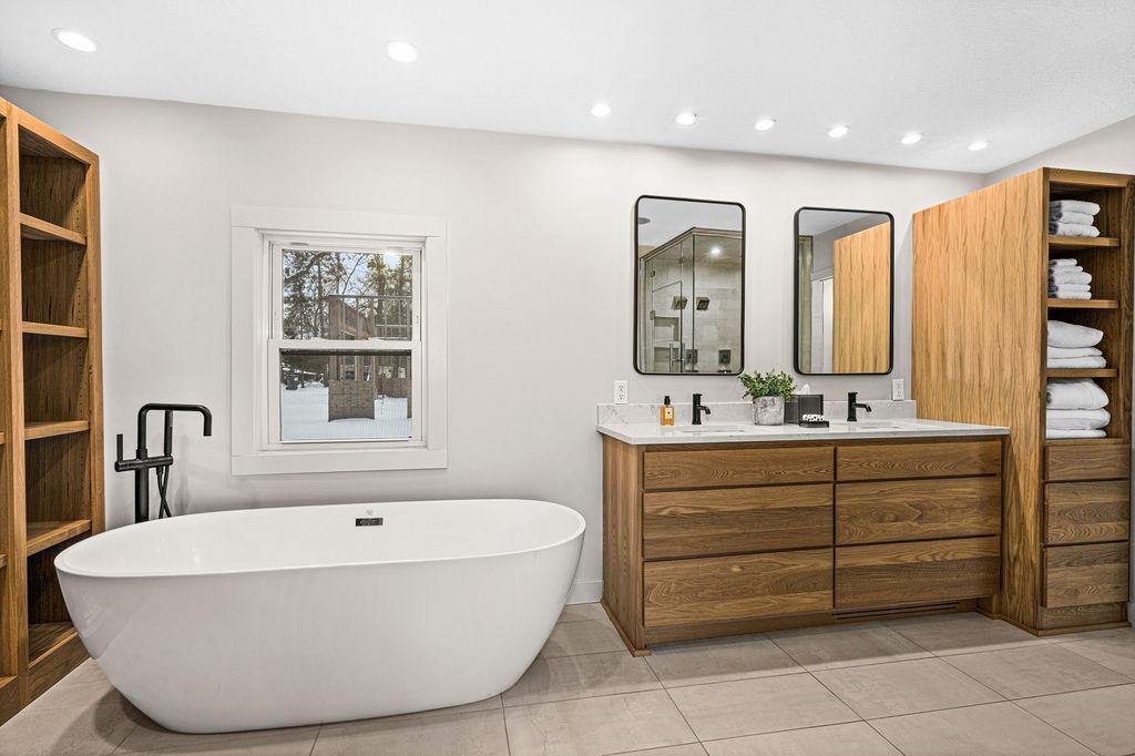 Enjoy recently updated amenities like a spa-like freestanding soaking tub/faucet.