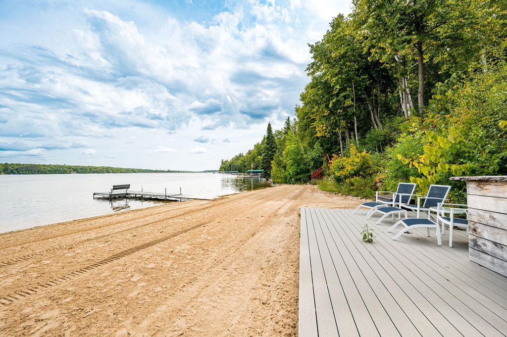 Relax and unwind by the water. There is no dock currently on the shoreline.