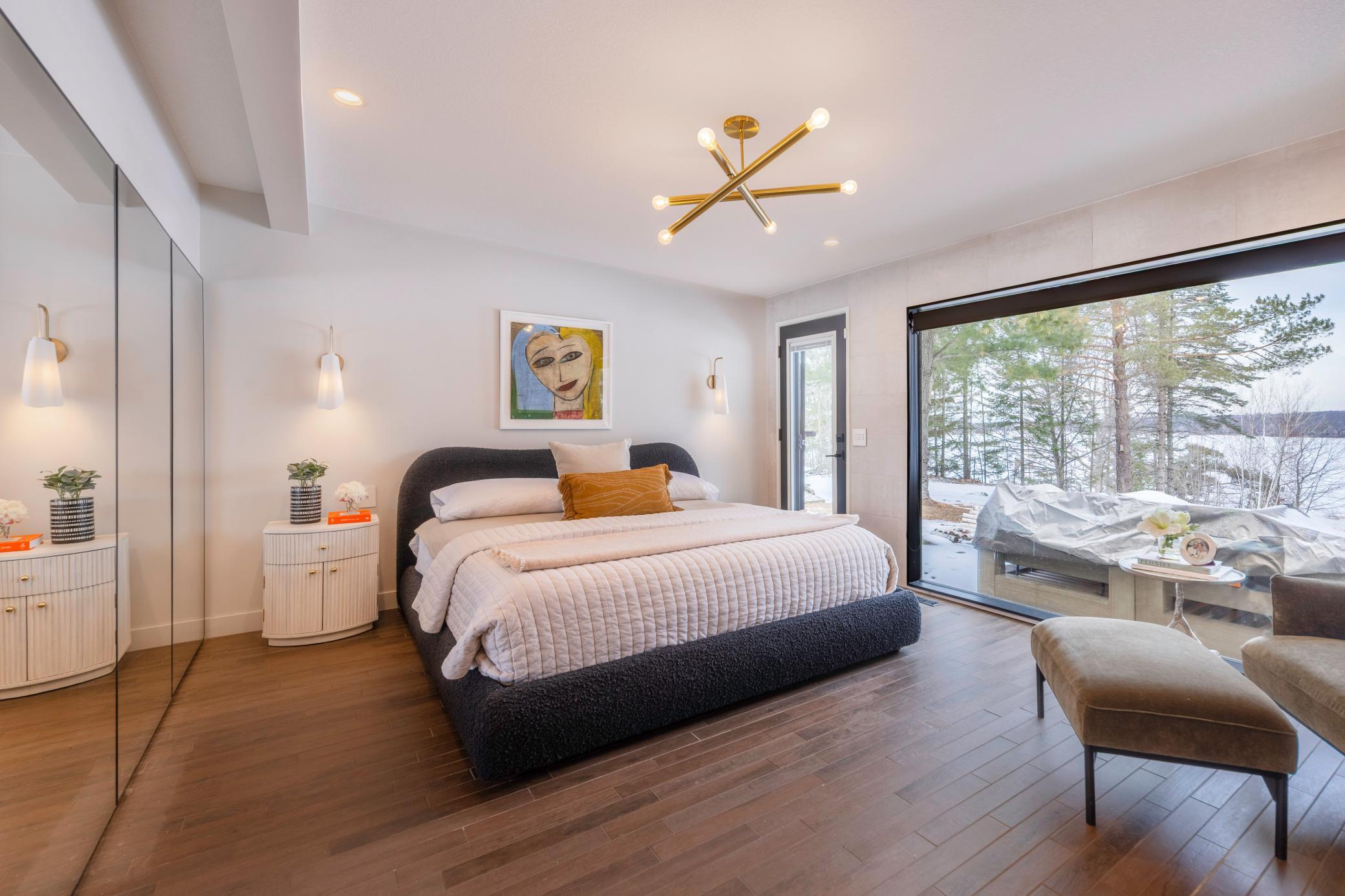 Step into the spacious primary bedroom.
