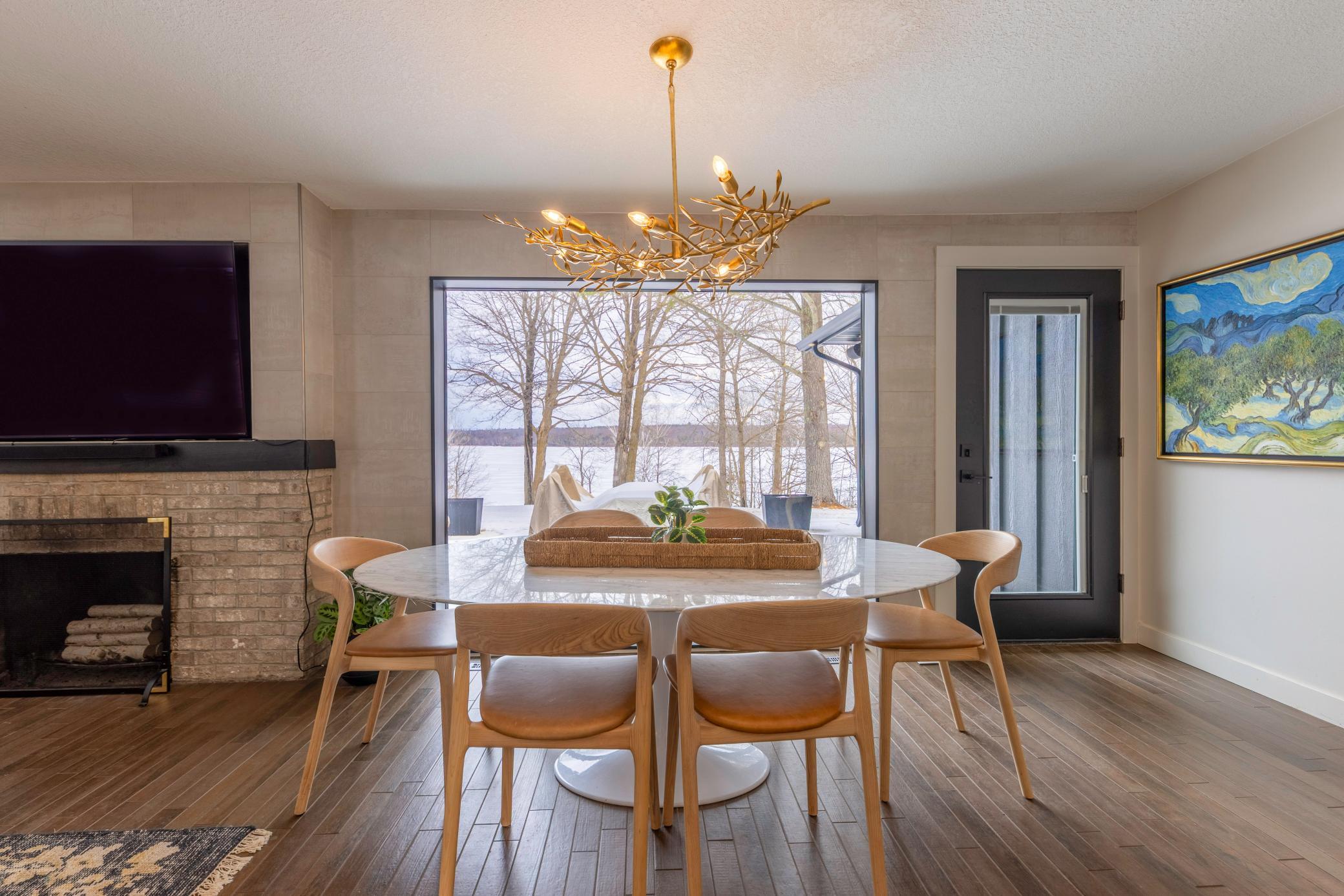 Gather around and make memories in this cozy, sunlit dining nook.
