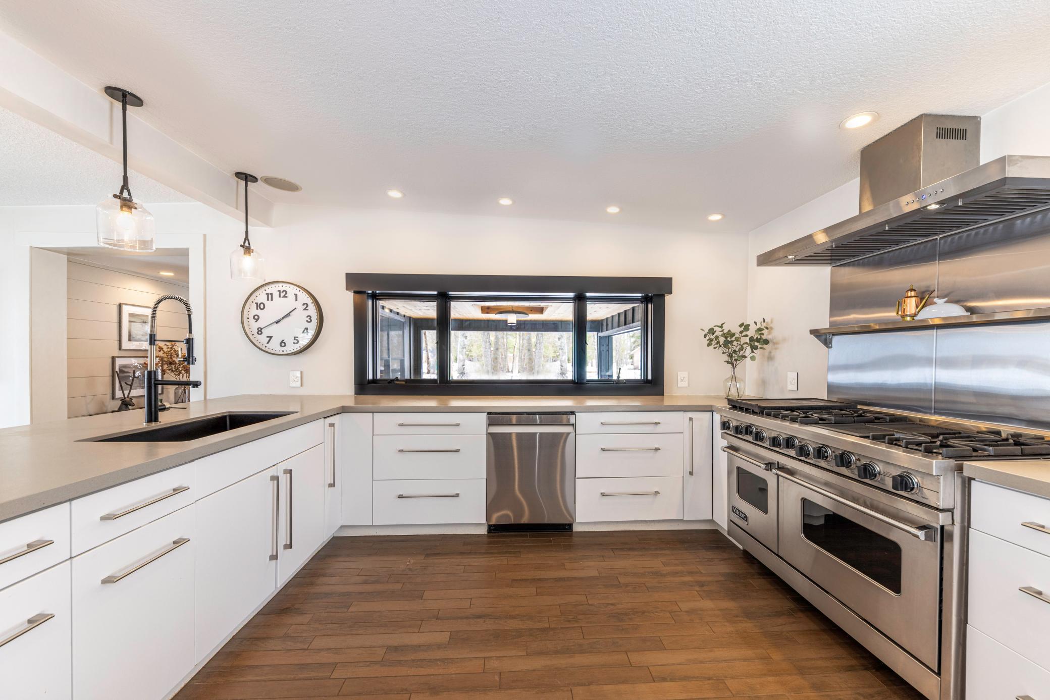 Wonderful kitchen window allows for natural light to enter and flood the kitchen.