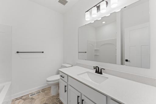 (Photo of an inventory home, actual homes finishes will vary) The secondary bath.