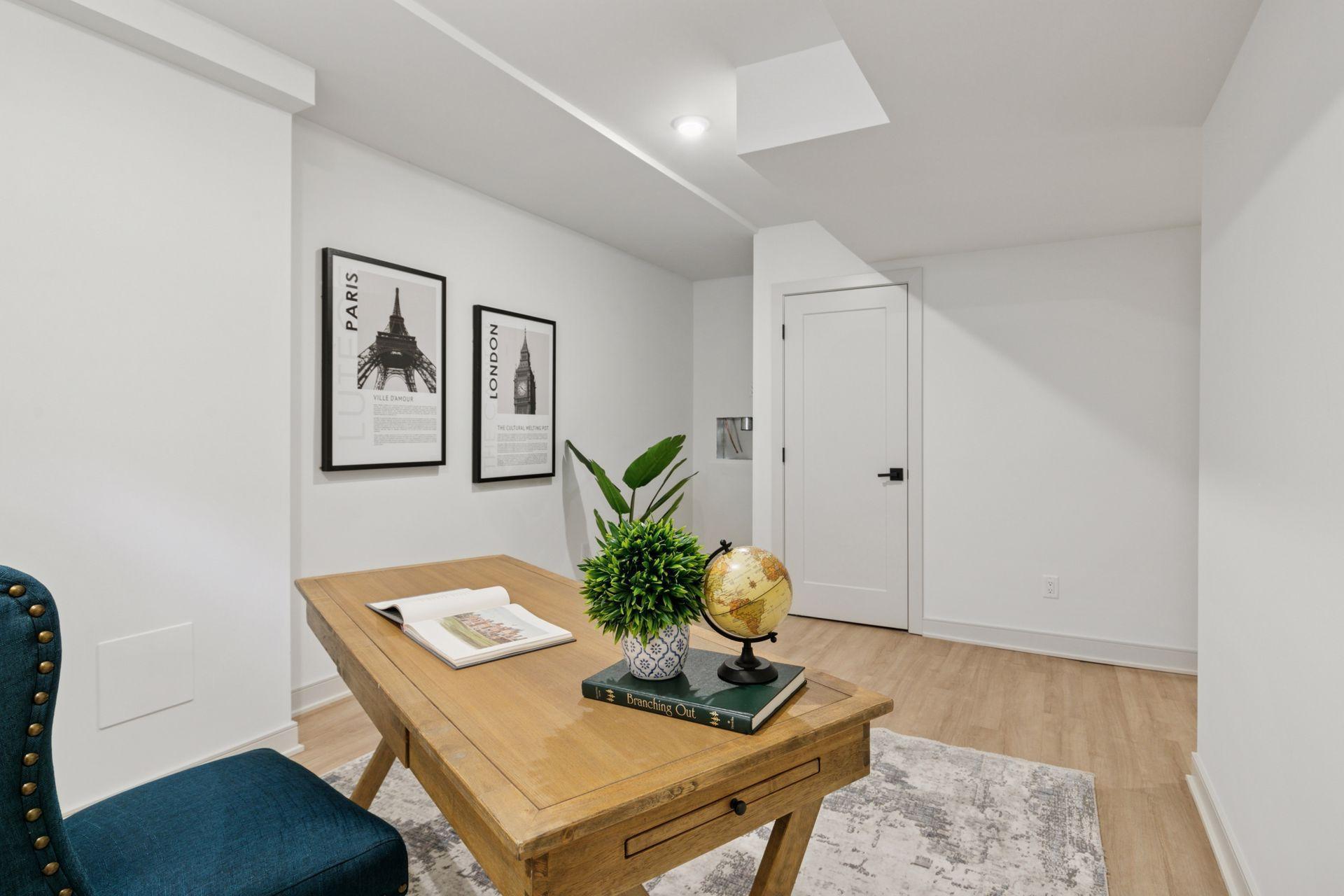 A home office or a bedroom. The lower level is a perfect spot to get away and get some work done.