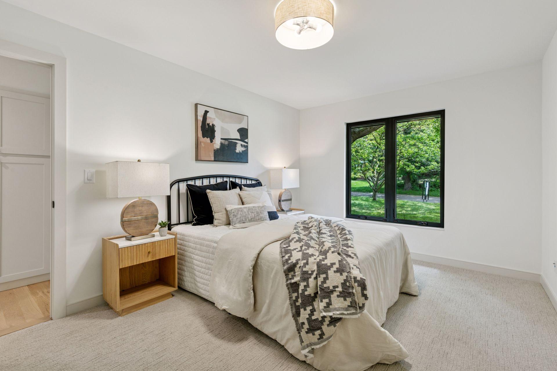 One of 3 expansive main level bedrooms with plenty of closet space and beautiful views.
