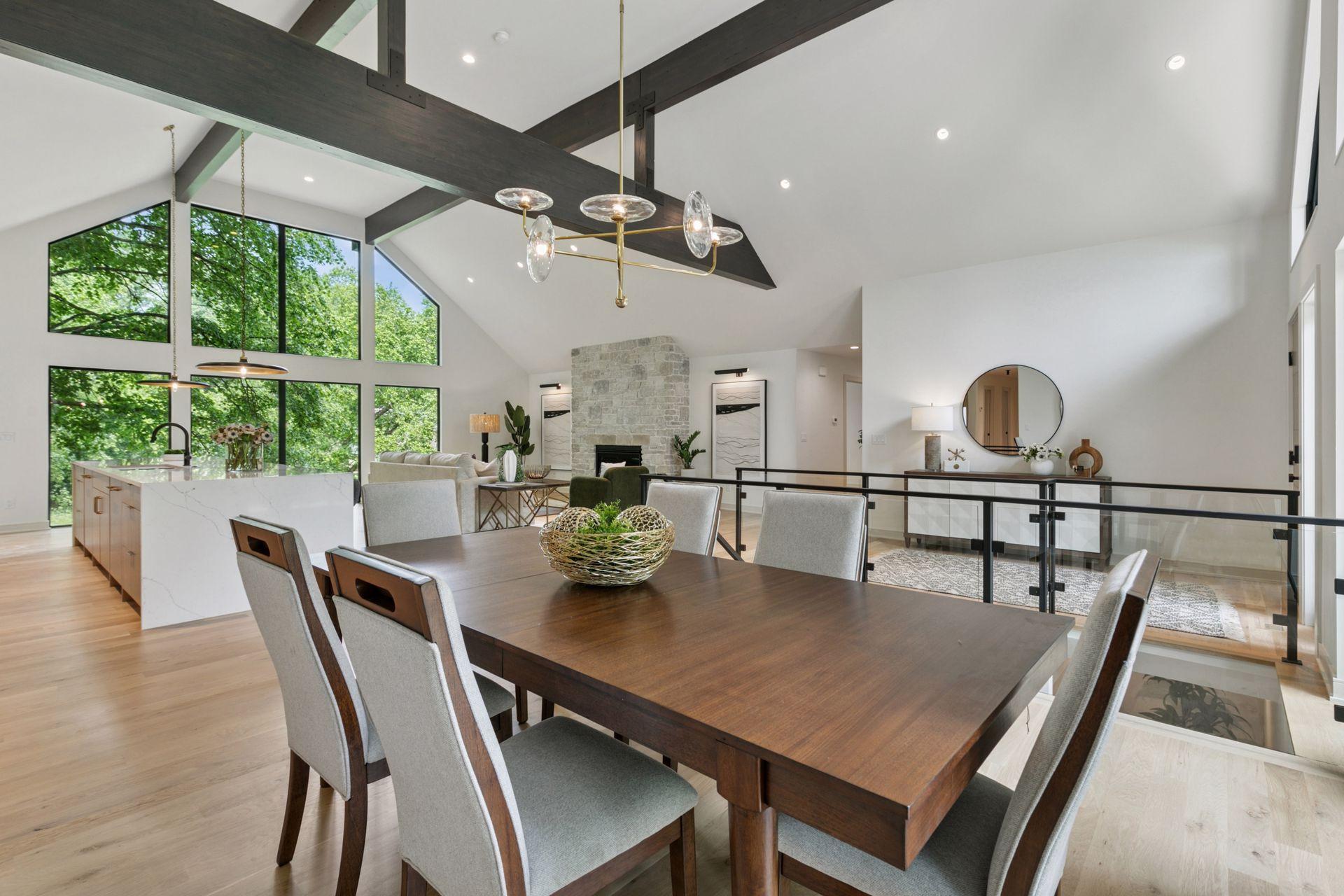 The dining area is framed beautifully offering a wonderful connected feel to the rest of the great room