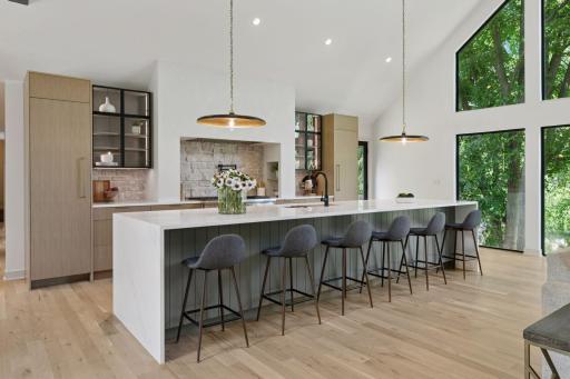 This extraordinary custom designed island features Alaska Bianca Quartz
