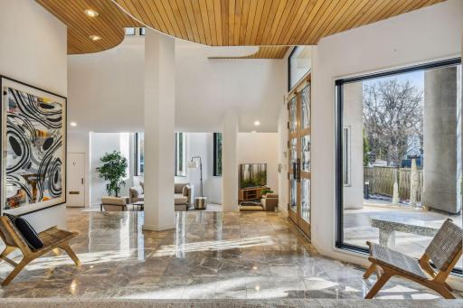 Stunning entrance to soaring 20+ ceilings
