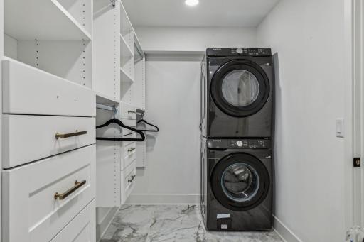 Primary closet laundry, one of two laundry facilities onsite.