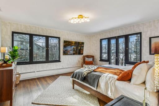 Sun-filled primary bedroom with 2nd primary closet