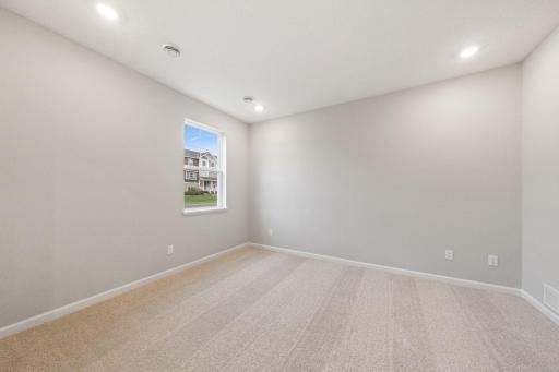 Photos of former model home, options and color selections will vary.