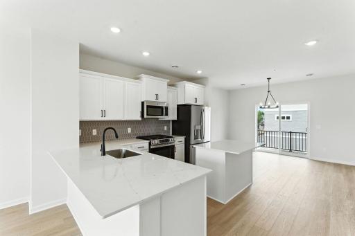 All Pictures are Illustration Only - Gourmet Kitchen will have natural wood tone cabinets