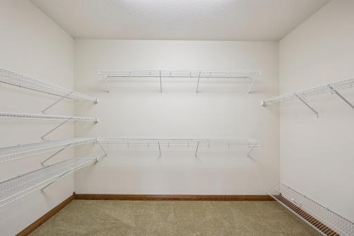 Large walk in closet in primary bedroom