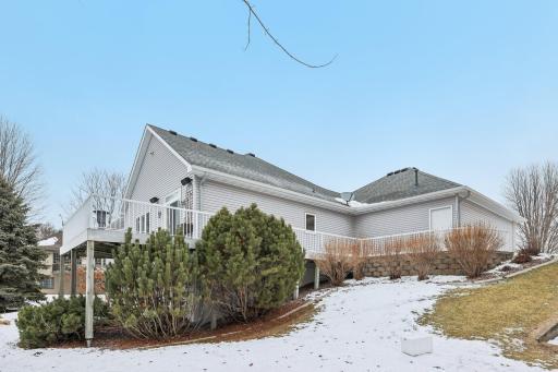 Deck off the dining room, connects to garage