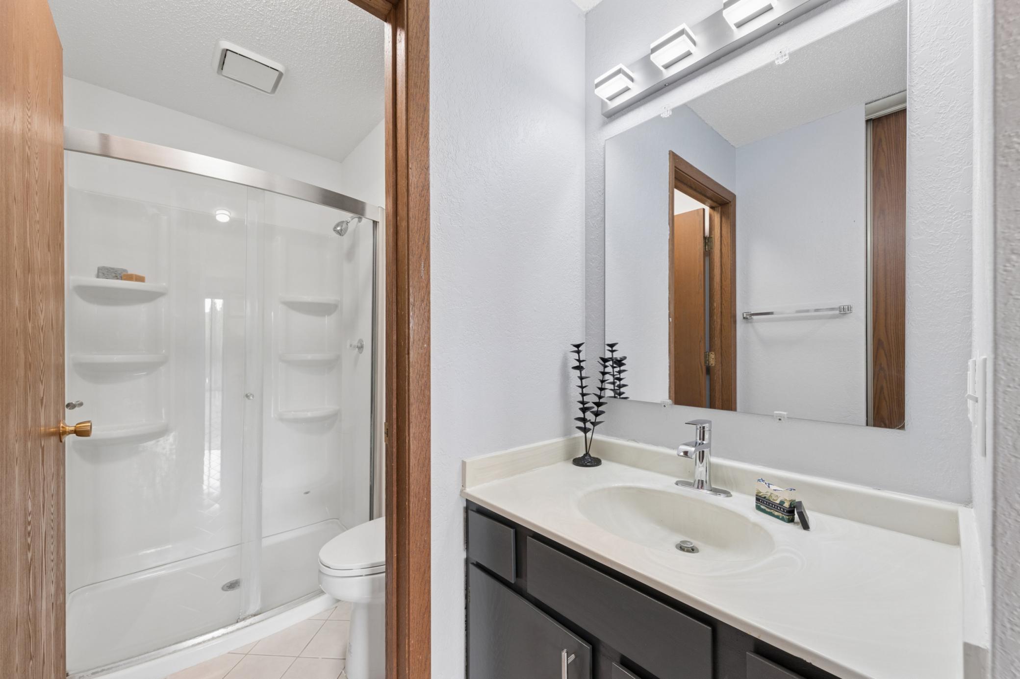 Private primary bathroom and vanity