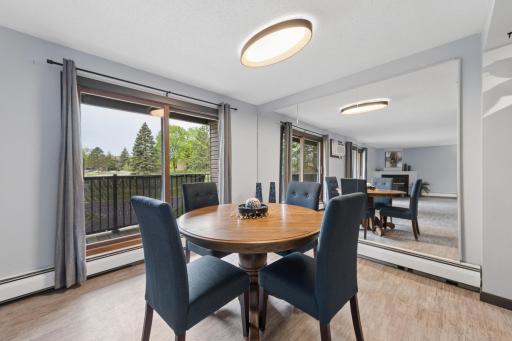 Dining is open to kitchen, living room, and double deck! mirrors are removable. Brand new lights.