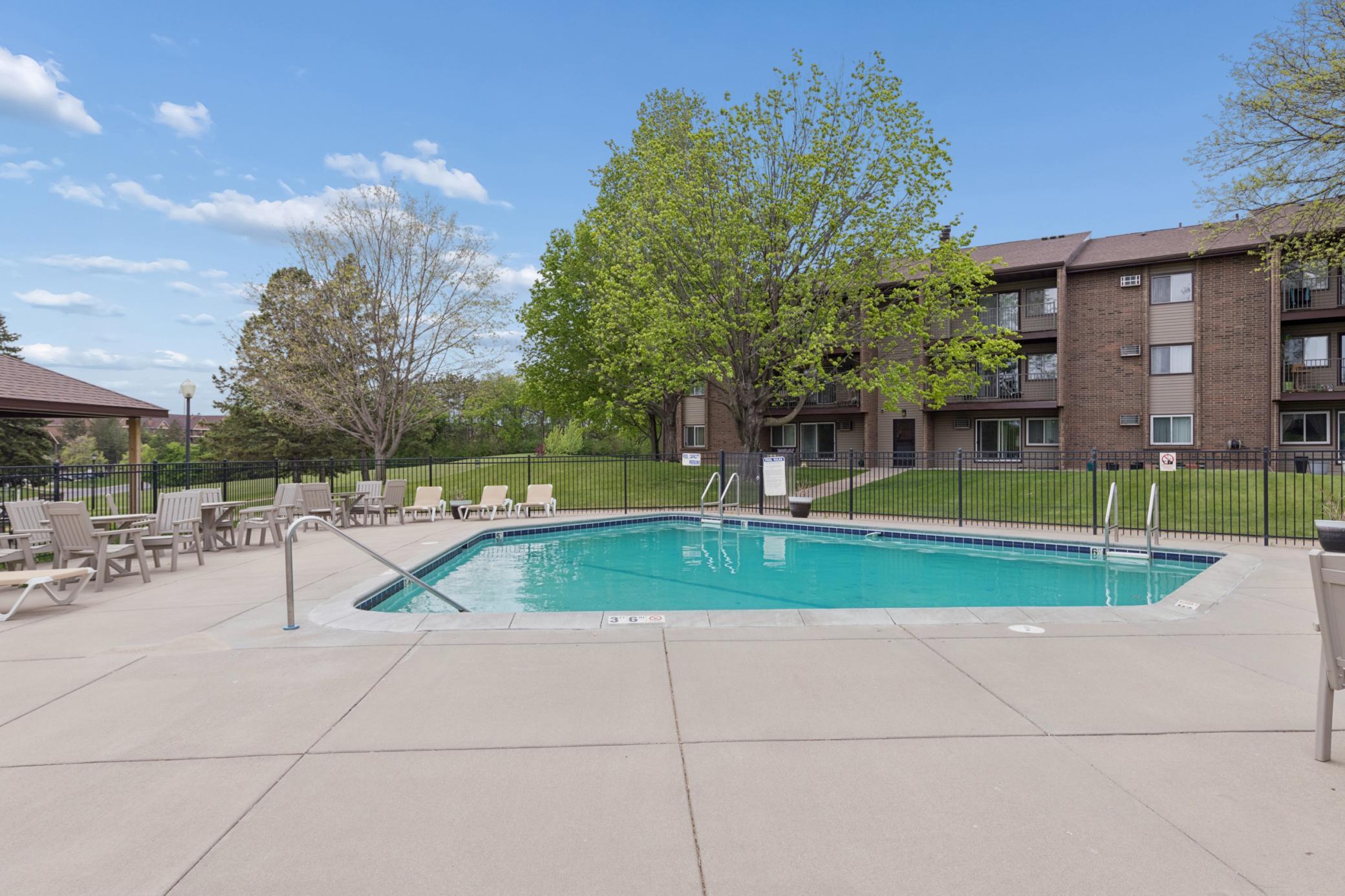 It really is so cool to have a pool in your own community! Sunbathing patio, picnic gazebo, and cool water. Perfect summer fun!