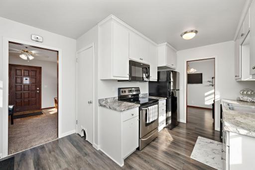 Attractive updated kitchen with new fridge in 2022 and a new microwave and dishwasher in 2024!