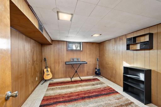 This lower level bonus room would make a great office, a craft room, or add an egress window and gain a 4th bedroom!