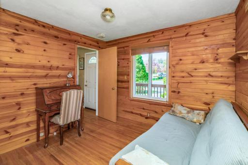 2nd bedroom on the main floor with hardwood floors