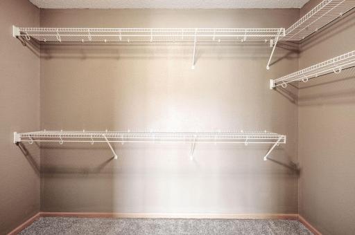 Spacious primary closet to hold all your clothes, shoes and the like!