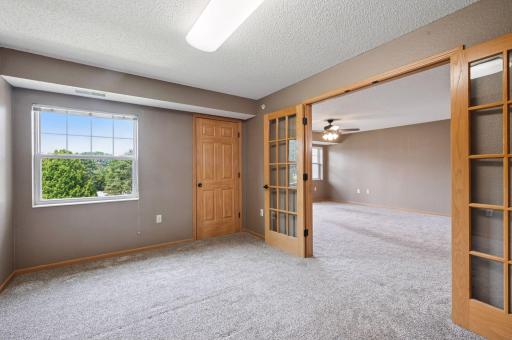 French doors keep this space light, bright and flexible.