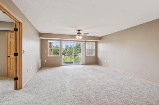 Living room sliding glass doors lead to your balcony.