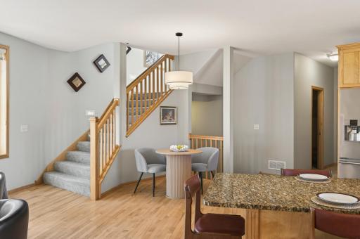 Cozy informal dining and open stairway to 2nd level!