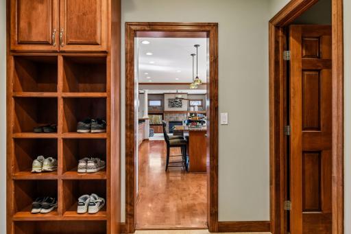 More shoe niches, the bathroom door and the entry to the kitchen....