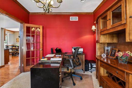 See the crown moulding at the ceiling and the proximity to the kitchen.