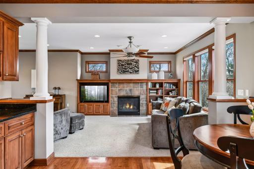 A favorite picture, this one shows the comfortable family room that flows from the kitchen, through a perfect music/living room area and back around to the foyer.