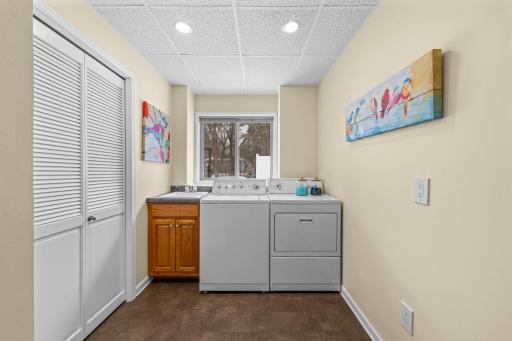 Spacious laundry room with utility sink
