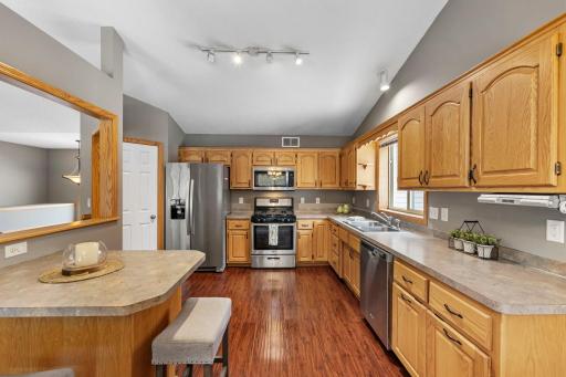 Eat-in kitchen with stainless steel appliances