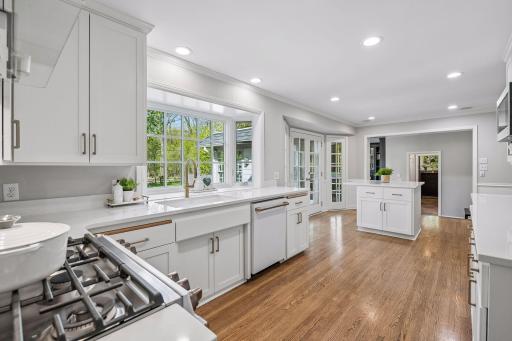 Remodeled kitchen, cafe suite appliances, and soft-close drawers and cabinets.