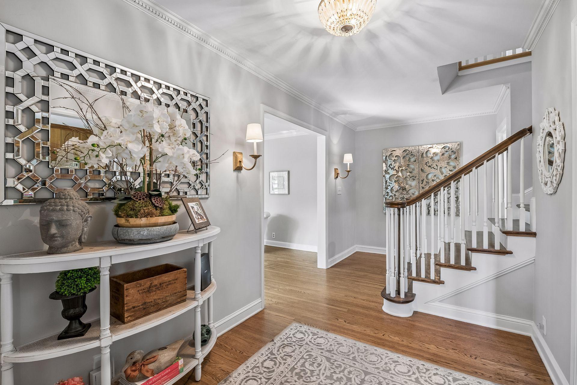 Foyer, great art space and focal point stair